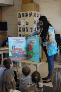 Renbrook parent presenting her books to Beginning School students
