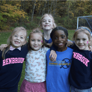 group of 5 diverse elementry age girls posing together