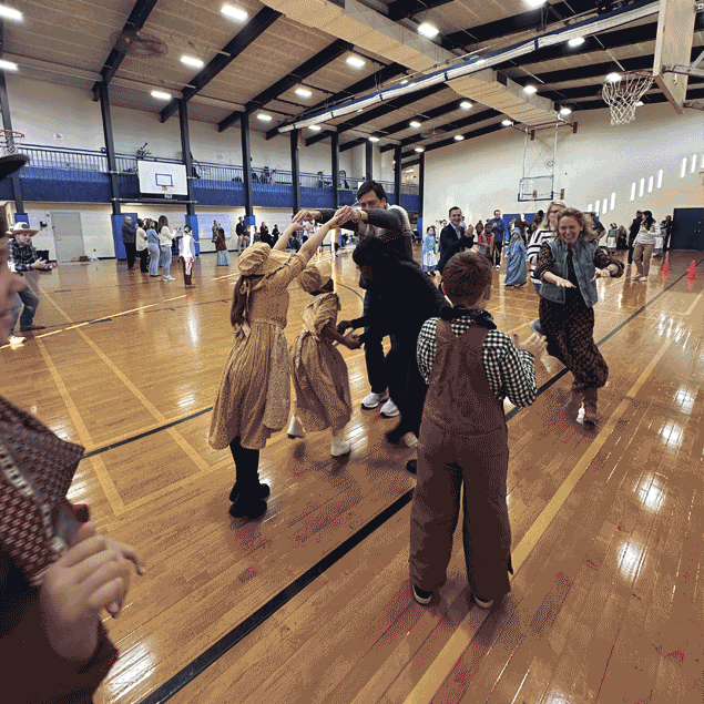 students and parents square dancing